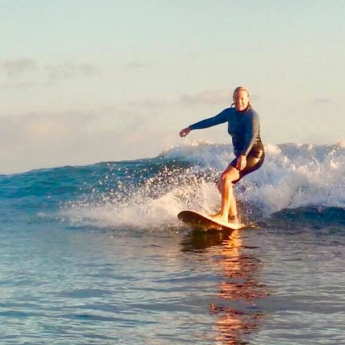 Rose Law surfing instructor